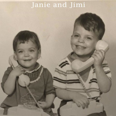 Janie and Jimi when they were children holding phones