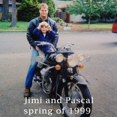 Jimi and Pascal on a motorcycle in 1999