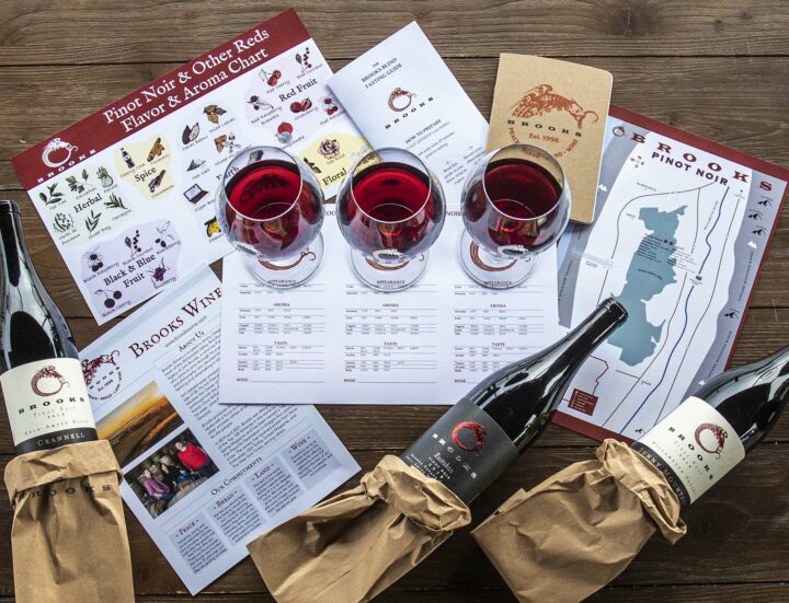 Three bottles of Brooks wine plus a Tasting Guide, Brooks Scout Book and our Brooks flavor and aroma charts