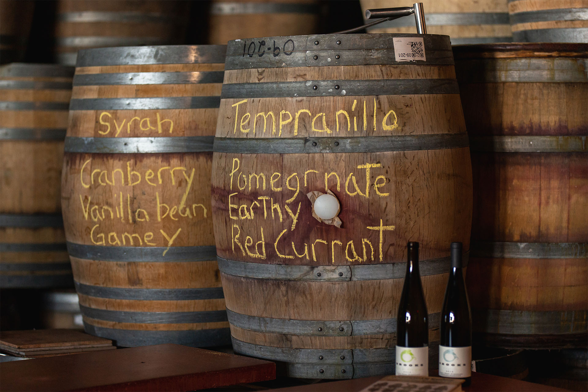 Barrels of Brooks Wine marked with Varietal and flavor notes