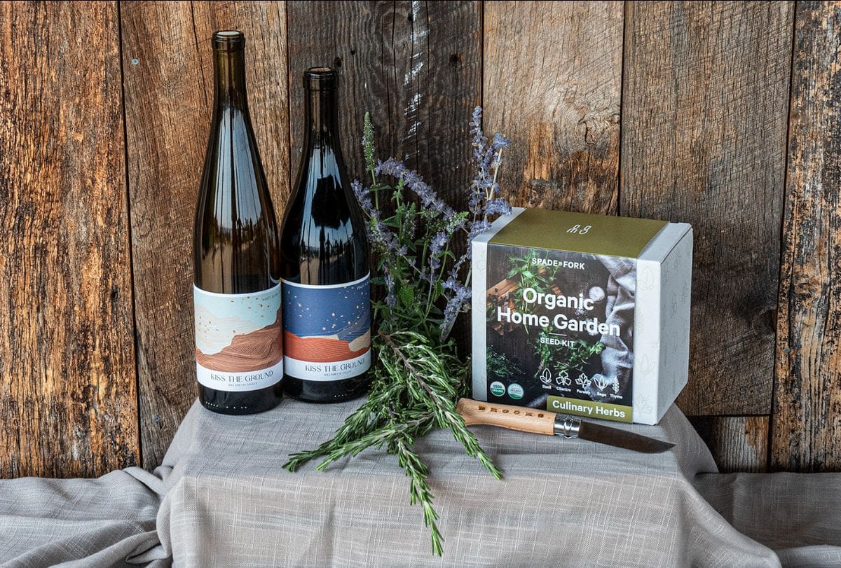 Bundle of wines, gardening knife, and herb kit for March Beyond Brooks with Kiss the Ground.