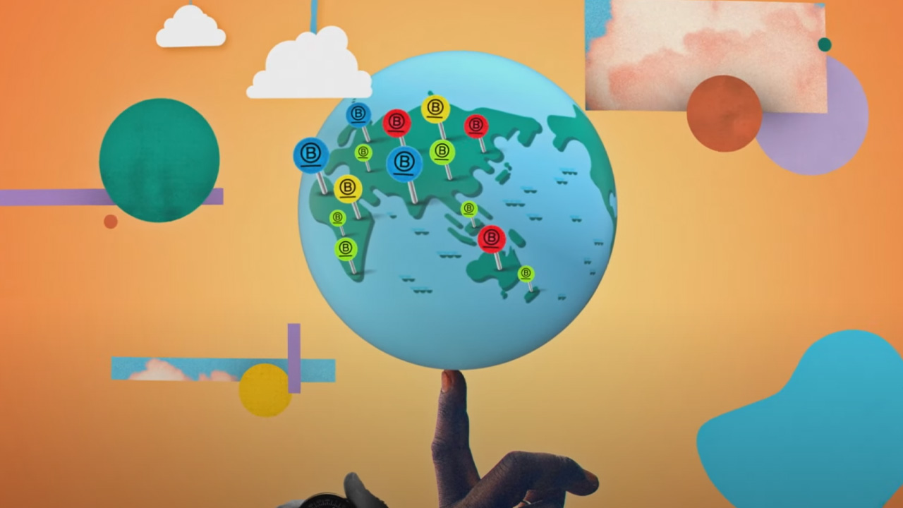 Graphic of Globe with B Corp pins representing B Corp members around the world