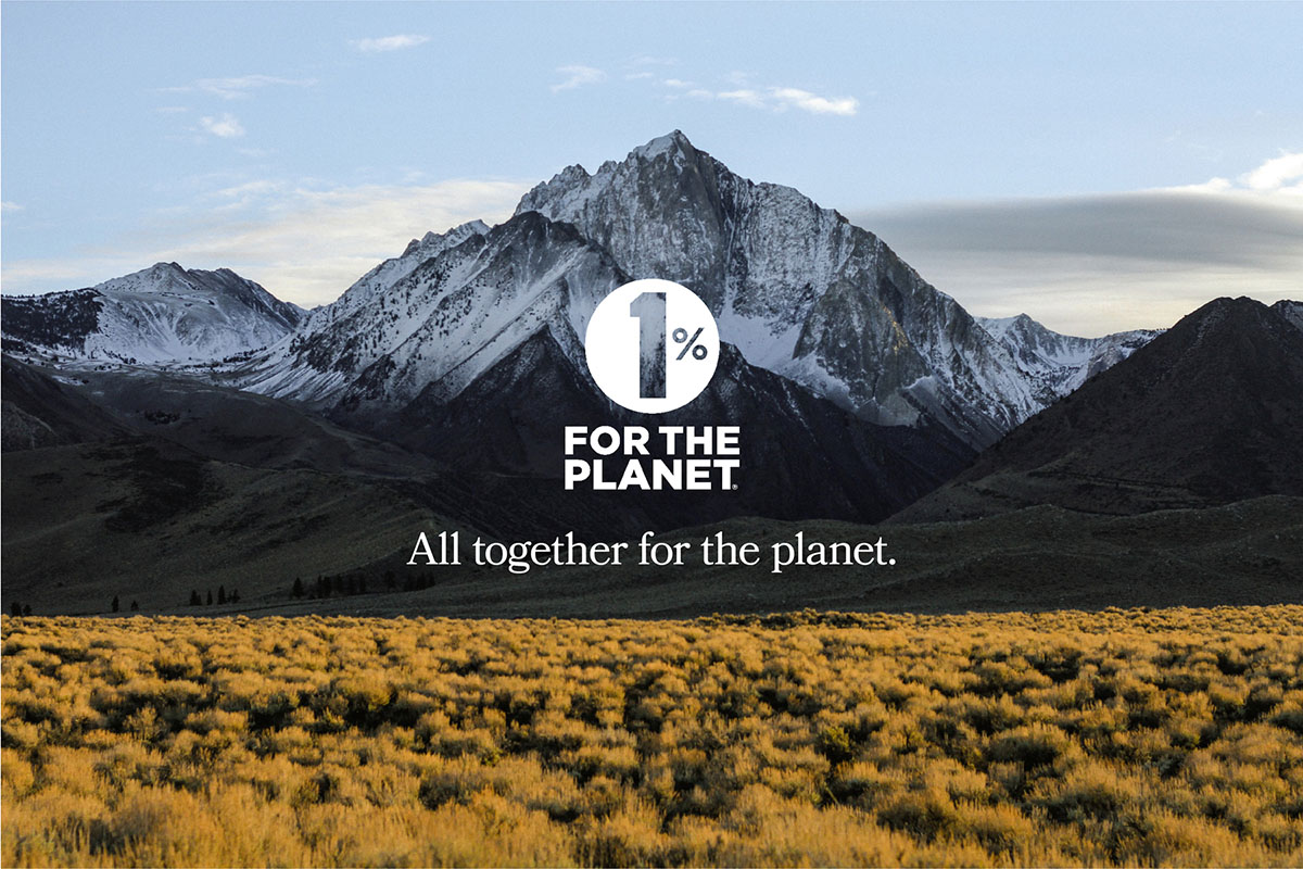 Landscape with mountains with One Percent for Planet Logo and reads, 