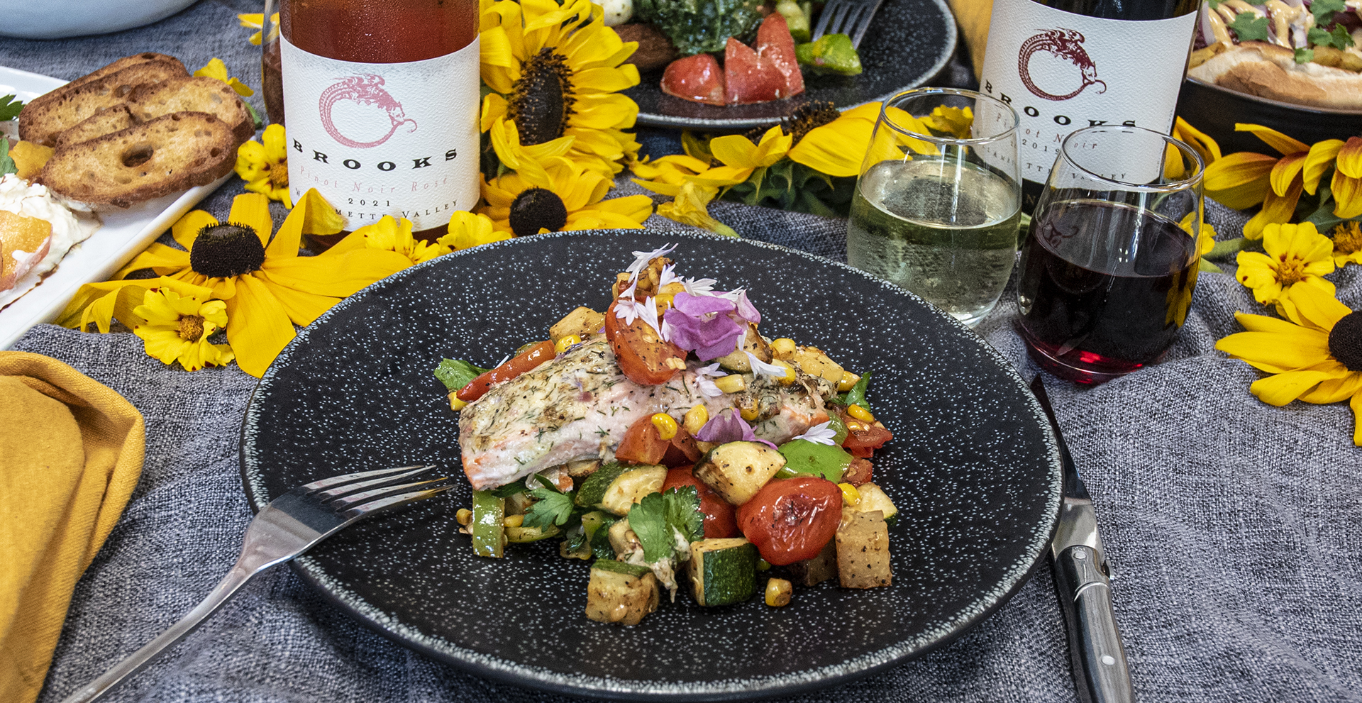 Aioli-baked salmon over vegetable succotash