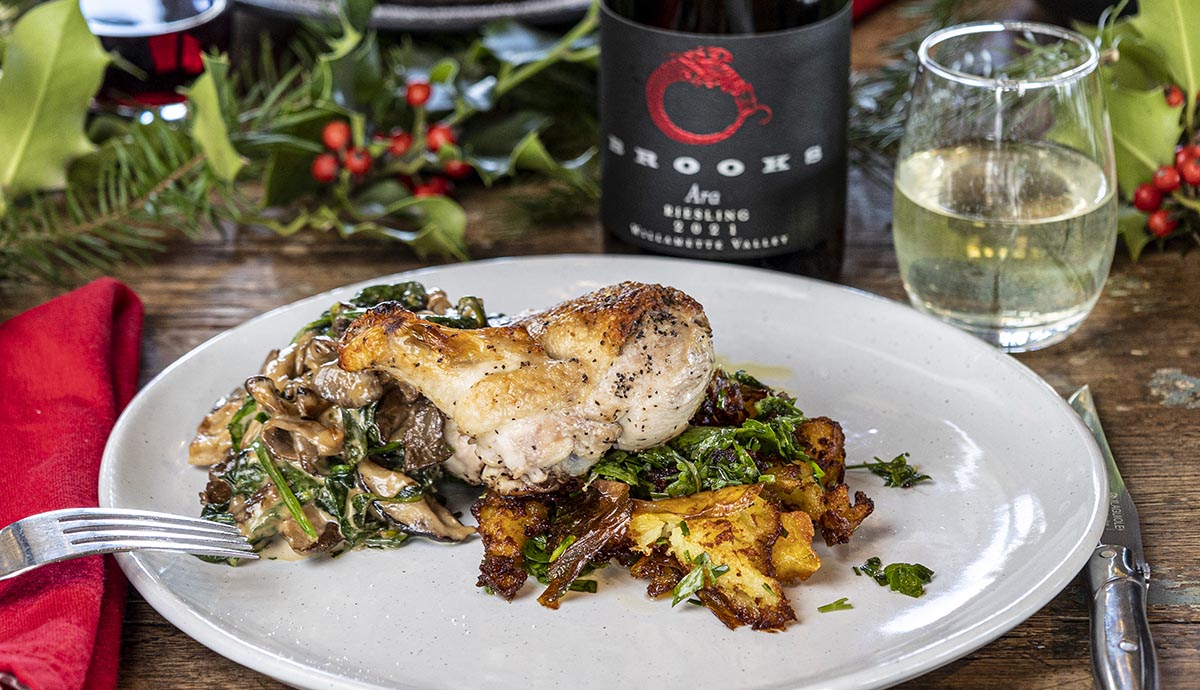 Pan-seared airline chicken, with Marsala cream mushrooms and smashed potatoes