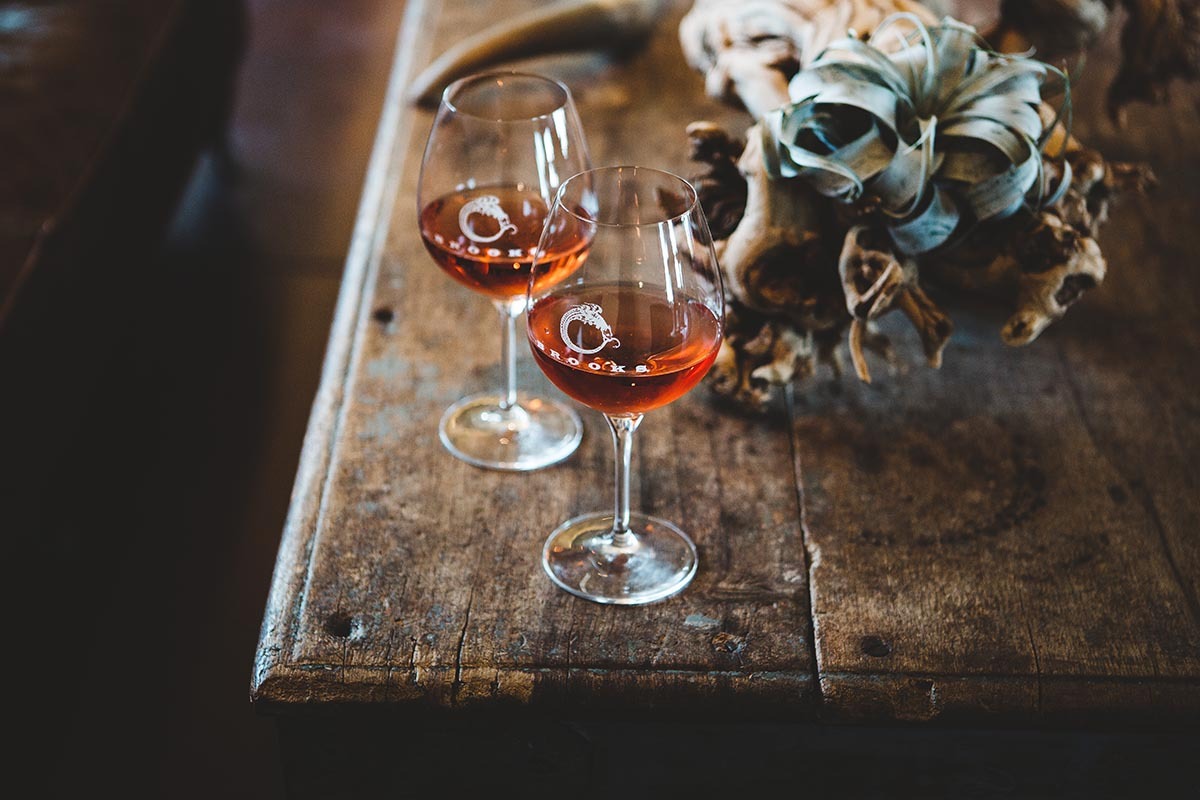 Two stemmed glasses of rose made from Pinot Noir grapes; a refreshing style of this noble grape. 