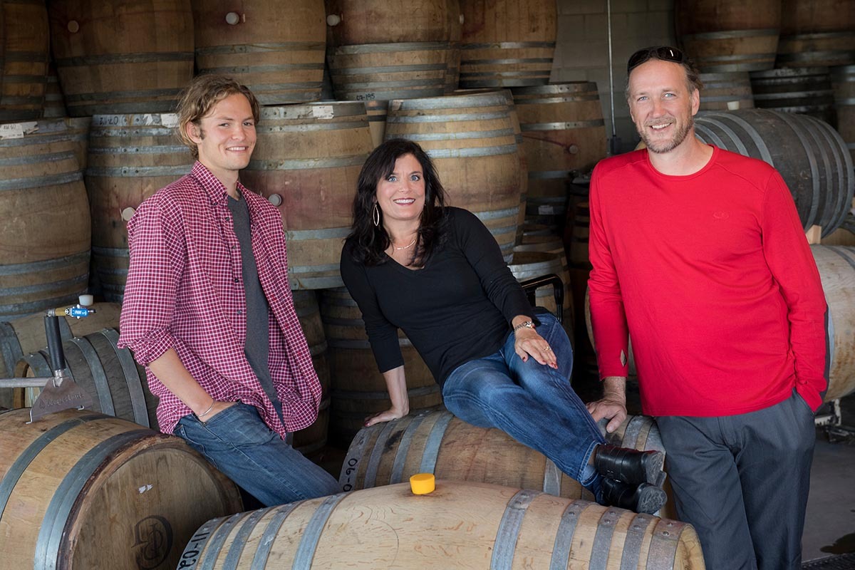 Pascal Brooks, Janie Brooks, and Chris Williams in Brooks' barrel room.