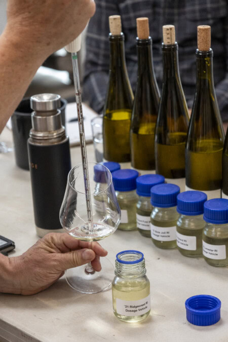 Bottled wines are assessed for quality before being shipped out for trials and competitions. 