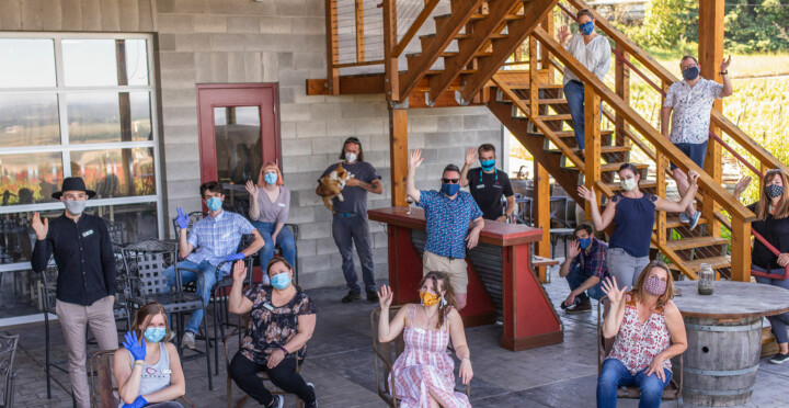 Brooks staff on patio with masks